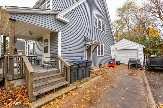 exterior space with an outdoor structure and a garage