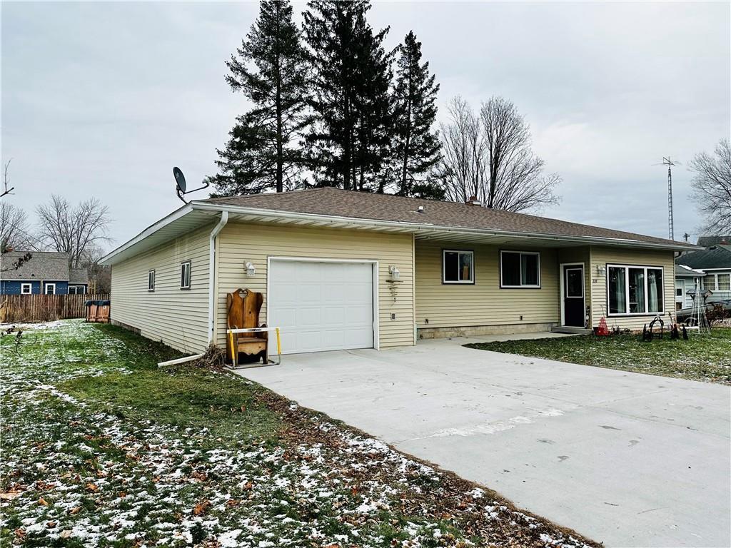 back of house with a garage