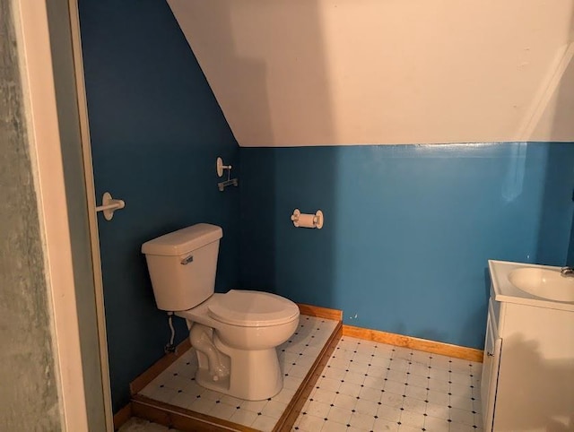 312 Railroad St, Norwalk, WI 54648 - bathroom with toilet, vanity, baseboards, and tile patterned floors