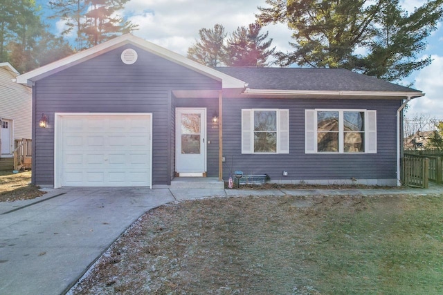 ranch-style house featuring a garage