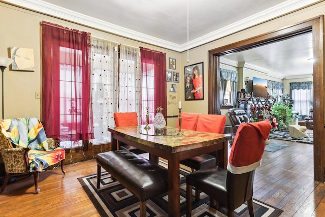 dining area featuring plenty of natural light and hardwood / wood-style floors