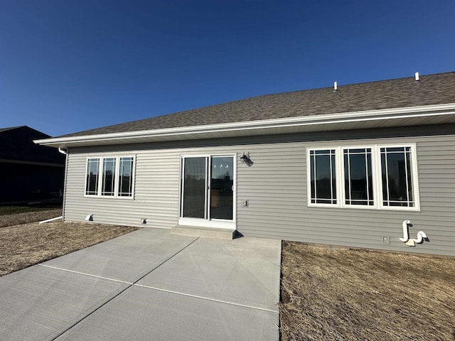 rear view of property with a patio area