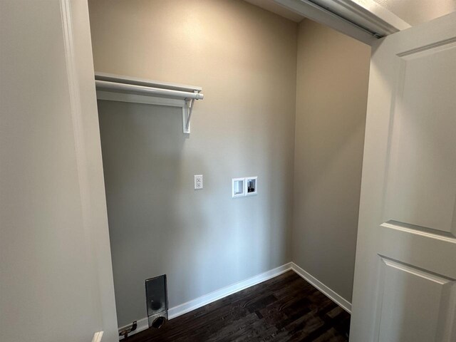 washroom featuring dark hardwood / wood-style flooring and hookup for a washing machine