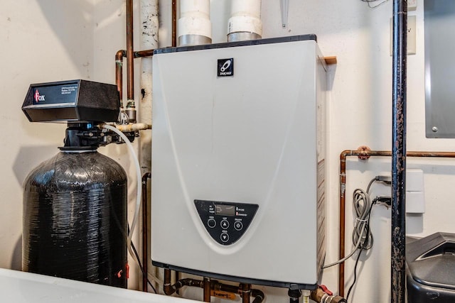 utility room with tankless water heater