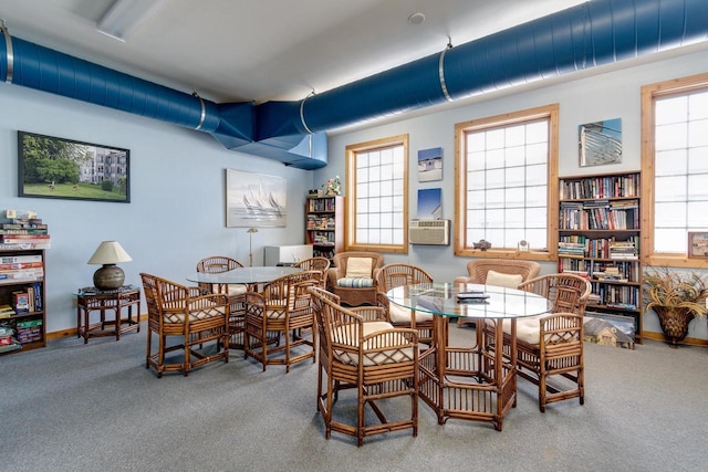 view of carpeted dining area