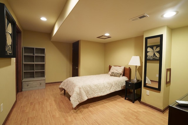 bedroom featuring light hardwood / wood-style floors