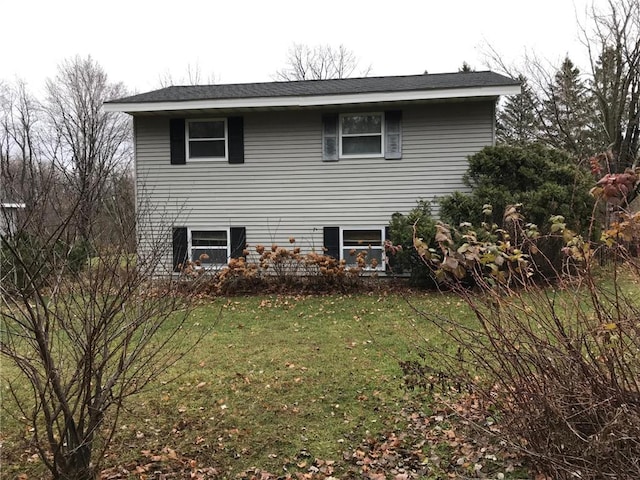 view of home's exterior featuring a yard