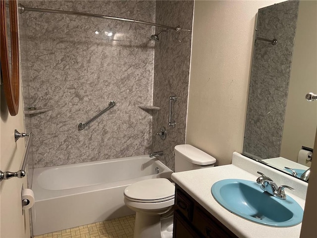 full bathroom with tile patterned flooring, vanity, tiled shower / bath combo, and toilet