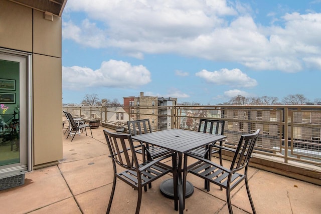 view of patio with a balcony