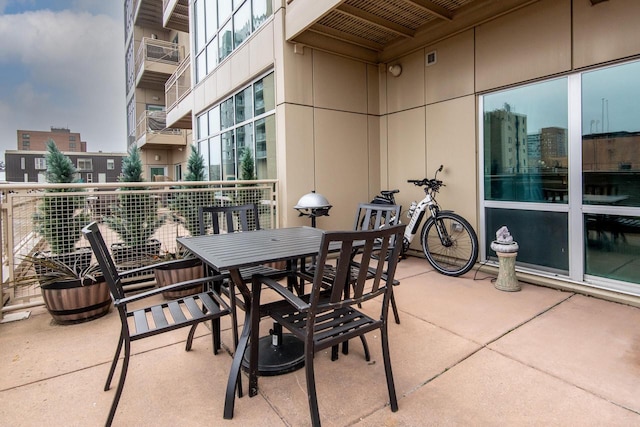 view of patio with a balcony