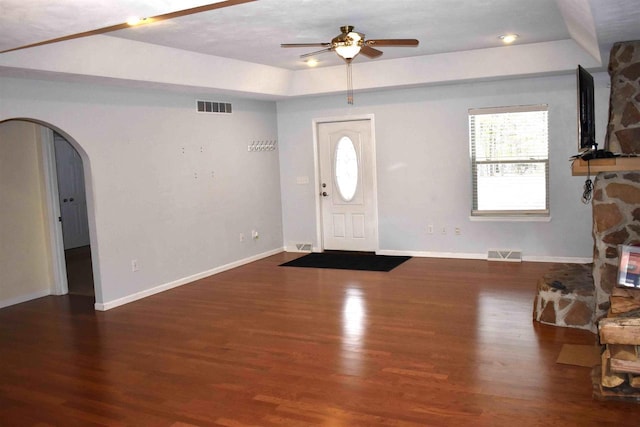 foyer featuring dark hardwood / wood-style flooring and ceiling fan