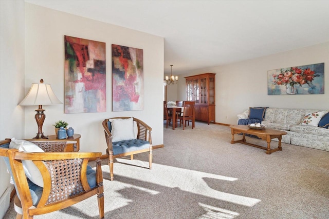 living room featuring an inviting chandelier and carpet flooring