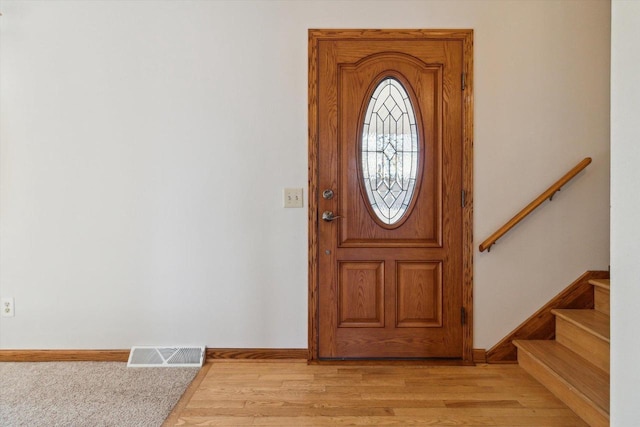 entrance foyer with light hardwood / wood-style floors