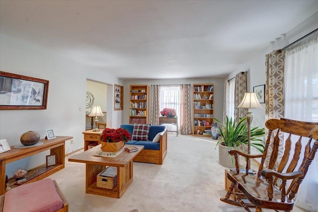 living room with light colored carpet