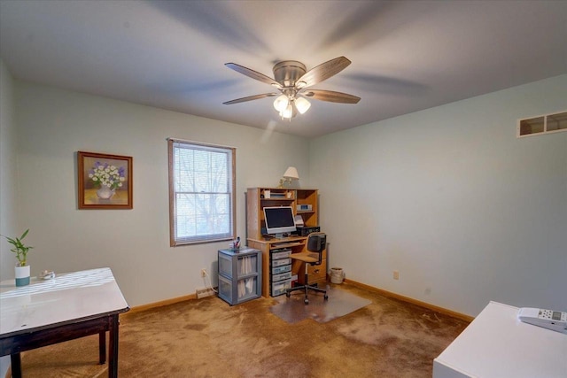 carpeted office with ceiling fan