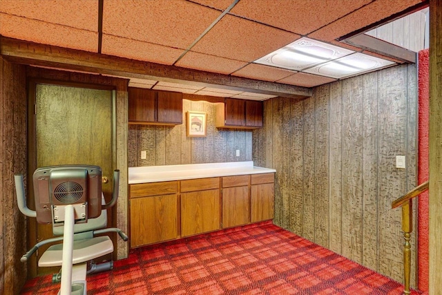 kitchen featuring a drop ceiling