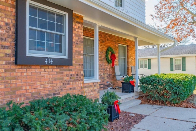 doorway to property with covered porch