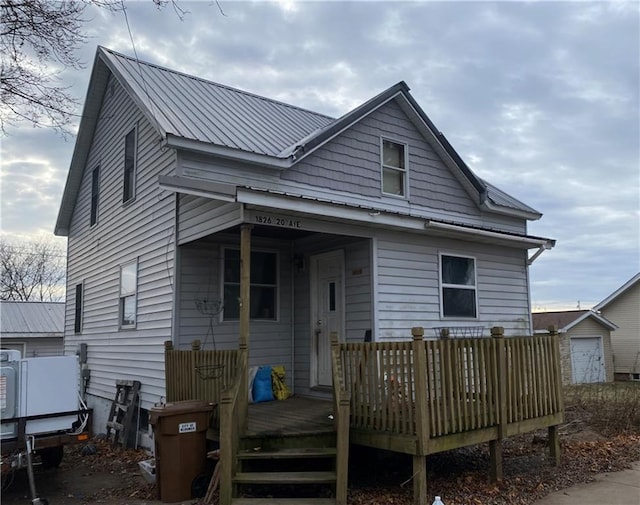 rear view of house with a deck