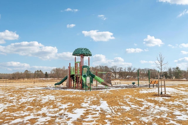 snow covered playground featuring playground community