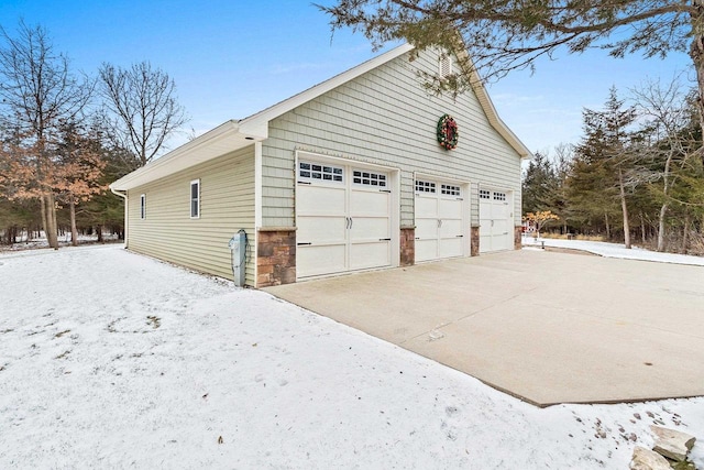 view of snow covered garage