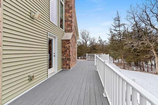 view of snow covered deck