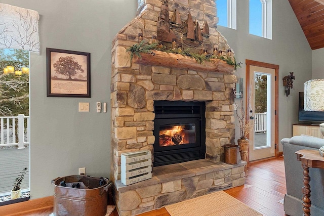 interior details with a fireplace and wood-type flooring