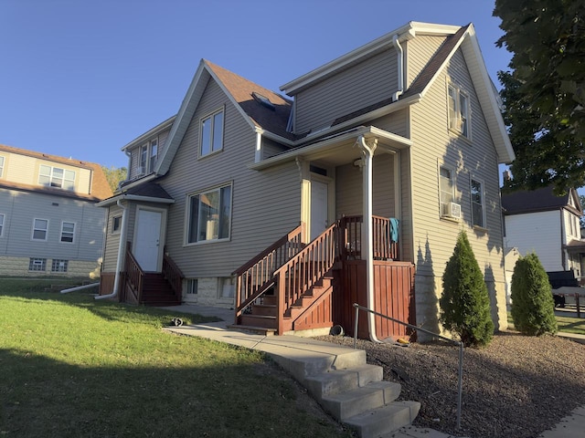 view of front of property with a front lawn