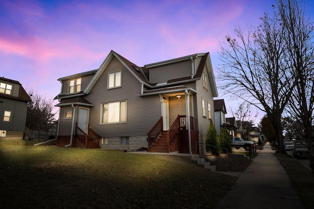 view of front of home featuring a yard