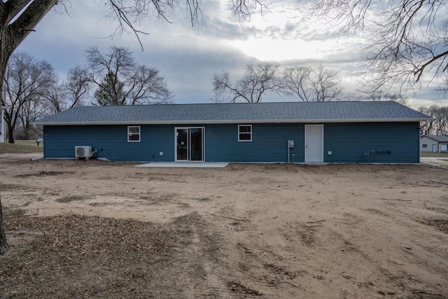 back of property featuring ac unit and a patio area