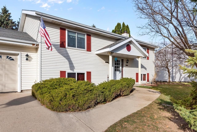 view of front of property with a garage