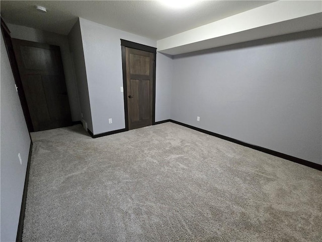 unfurnished bedroom with light carpet