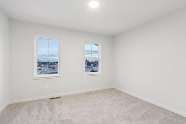 view of carpeted spare room