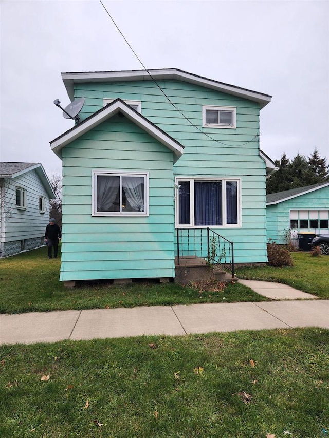 view of front of house with a front yard