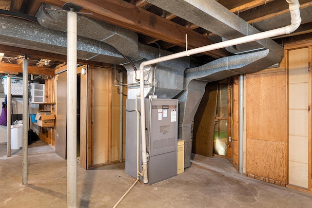 basement featuring heating unit