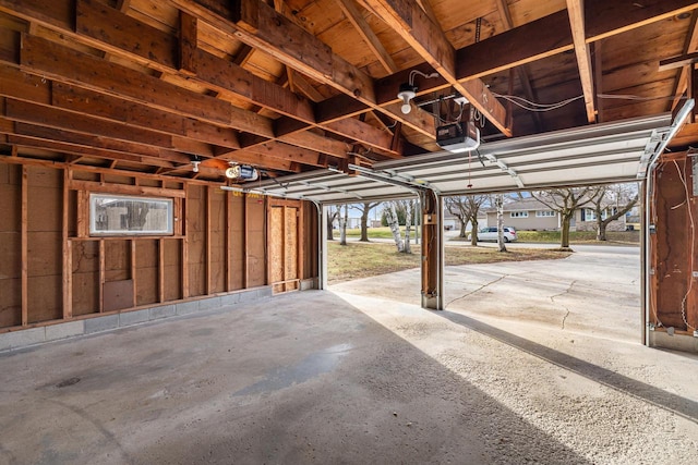 garage featuring a garage door opener