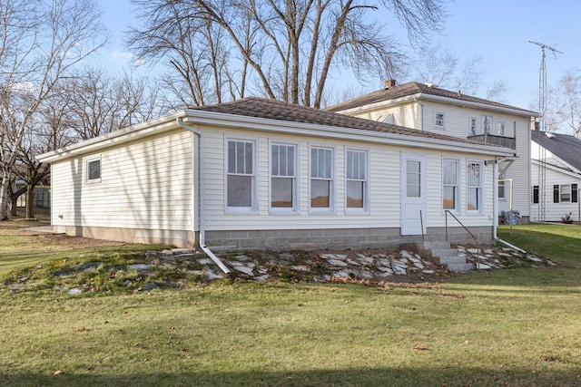 view of property exterior featuring a yard