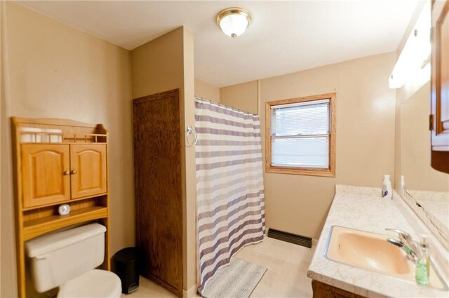 307 W Humbird St, Rice Lake, WI 54868 - bathroom with walk in shower, vanity, and toilet
