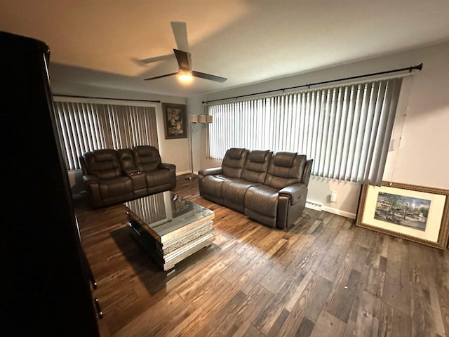 living room featuring hardwood / wood-style floors, a wealth of natural light, and ceiling fan