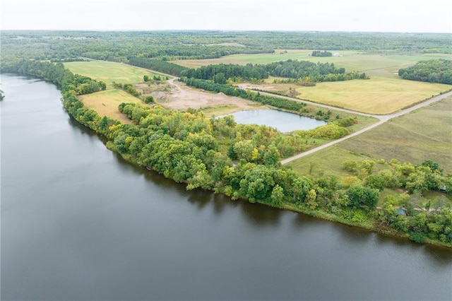 aerial view with a water view and a rural view