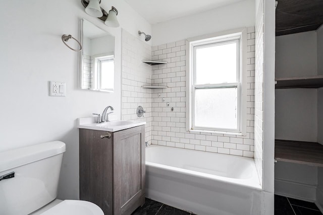 full bathroom with tile patterned flooring, vanity, and a healthy amount of sunlight