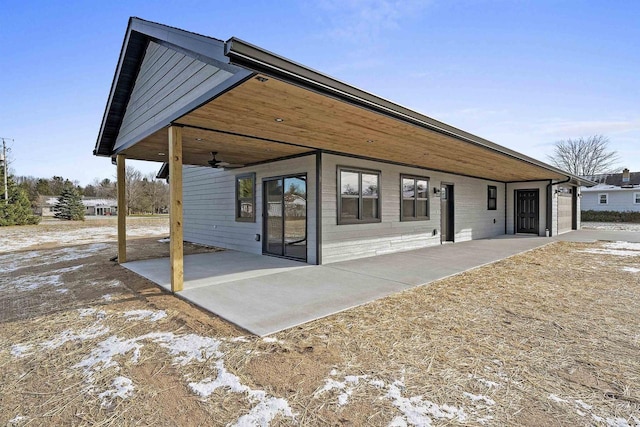 back of house with a patio area