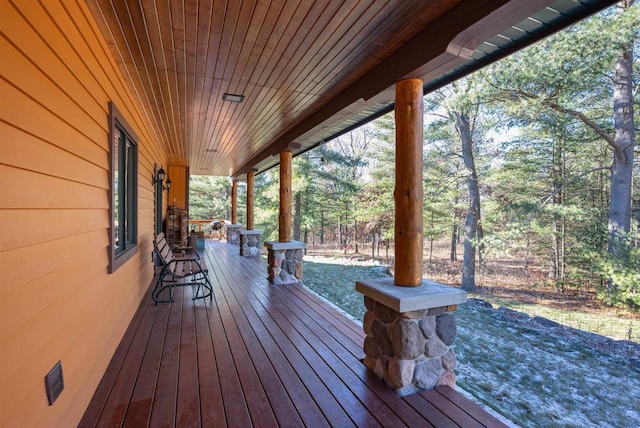 wooden terrace featuring a porch