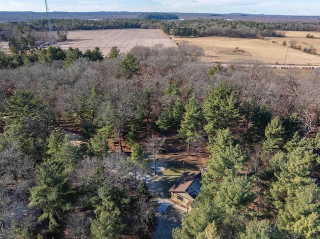 birds eye view of property with a rural view