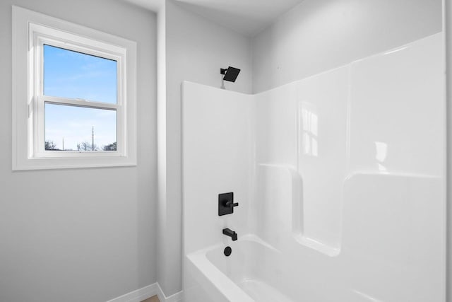 bathroom featuring washtub / shower combination