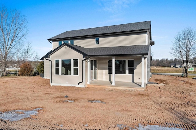 rear view of property with a patio