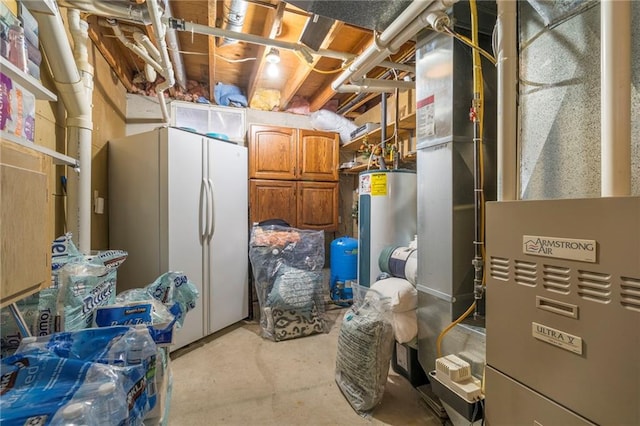 utility room featuring electric water heater and heating unit