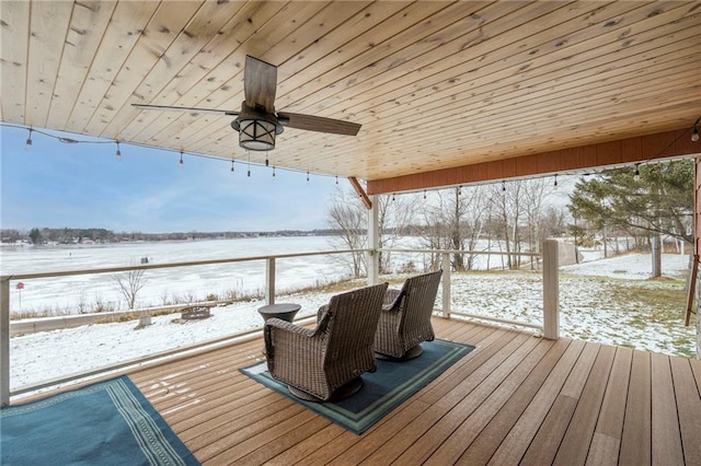 snow covered deck featuring ceiling fan