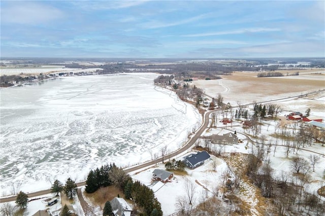 snowy aerial view featuring a rural view