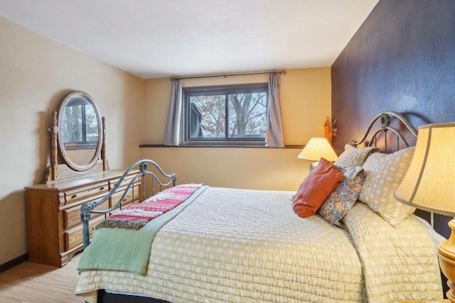 bedroom featuring light hardwood / wood-style flooring