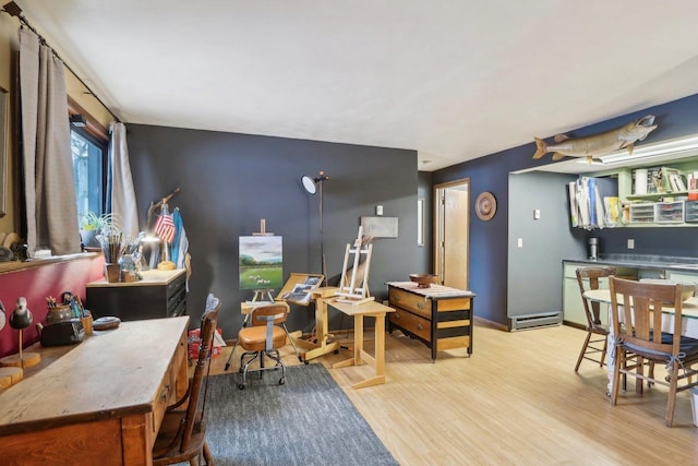 office area with light hardwood / wood-style flooring